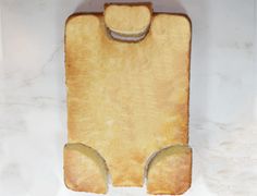 a piece of bread that is shaped like a bear