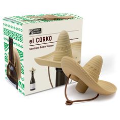 a wooden hat and wine bottle holder in front of a cardboard box with the lid open