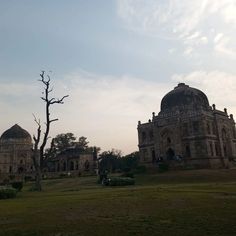 an old building in the middle of a park