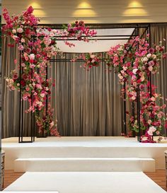 an image of a stage decorated with flowers