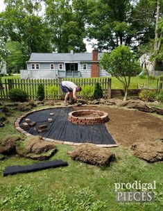 a man is working in the backyard