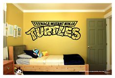 teenage mutant ninja turtles wall decal in a kids's bedroom with yellow walls