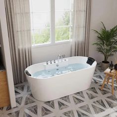 a white bath tub sitting under a window next to a potted plant in a bathroom