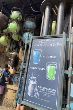 there is a sign with different drinks on it