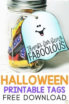 halloween printable tags in a mason jar with text overlay that says free printable