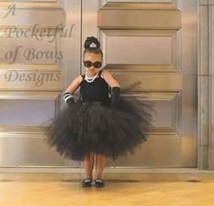 This tutu dress is all black with a fully lined top. It has an extra fluffy skirt with added fabric for a fuller skirt. Perfect for a birthday, flower girl dress, or special event! Available COLORS: white, black, light blue, yellow, light pink, ivory, silver, burgundy, peach, kelly green, lavender, red, orange, brown, purple, and plum. Available in clothing sizes: Newborn- 3M Overall length - 12 inches Top 5 inches Skirt 7 inches 3/6M, 6/9M. 9/12M Overall length-14 inches Top- 6 inches Skirt - 8 Toddler Formal Dress, Tutu Dress Black, Black Tutu Dress, Toddler Formal Dresses, Black Flower Girl Dress, Formal Dress Black, Birthday Tutu Dress, Black Toddler, Black Tutu