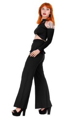 The moon made me do it. Loretta is an elegant pair of trousers designed for the stylish and refined woman. Made from a blend of materials consisting of 65% rayon, 30% polyester, and 5% spandex, these pants are not only beautiful but also wrinkle-resistant, ensuring they look perfect throughout the day. The incredibly high waist of these trousers not only has the ability to slim the silhouette but also elongate the legs, imparting elegance and confidence. The concealed zipper with a crescent moon-shaped pull adds a unique charm and a touch of mystery. Furthermore, these pants are equipped with practical side pockets for convenient storage of essentials. The flared seams towards the bottom give these trousers a light and elegant look, creating a bell-bottom effect that is both fashionable an Elegant High-waisted Viscose Pants, Formal Viscose Trousers, Chic Wide-leg Viscose Pants, Chic High-waisted Viscose Pants, Viscose Evening Trousers, Evening Viscose Trousers, Viscose Wide-leg Pants For Formal Occasions, Formal Viscose Wide-leg Pants, Viscose Stretch Wide Leg Bottoms