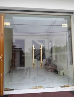 an open glass door leading to a living room