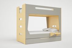 a bunk bed with two drawers and a pillow on it's bottom half is made out of plywood