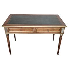 an antique writing desk with two drawers on one side and a chalkboard top on the other