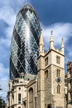 a large building with a very tall tower next to it