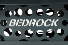 the bedrock logo is displayed in front of black and white polka doted background