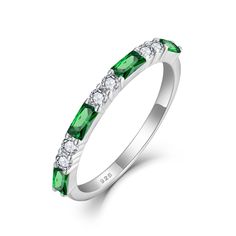 PRICES MAY VARY. Trendy Designs: This emerald ring is the most classic design and it will never go out of style. Perfect for any occasion with different outfits. The stacking ring can be worn alone or stacked with other eternity/wedding/promise/engagement/ rings. Make you shine and look stunning High Quality: Made of 925 sterling silver and rhodium plated. Hypoallergenic, nickel free, lead free. Setting with different cuts of 5A cubic zirconia stones, created emerald Package: The silver eternity Elegant Green Emerald Cut Stackable Rings, Elegant Green Channel-set Rings, Silver Eternity Ring, Thanksgiving Wedding, Eternity Rings, Wedding Promises, Trendy Designs, Rings For Her, Stacking Ring