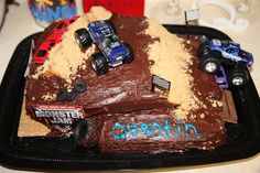 a birthday cake made to look like a monster truck