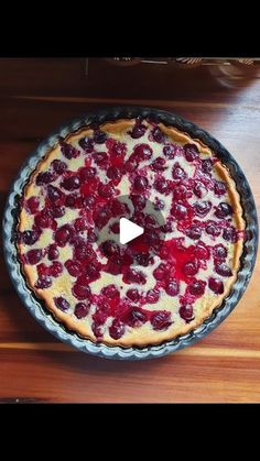 a pie sitting on top of a wooden table