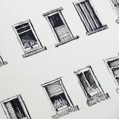 some drawings of windows and shutters on a sheet of white paper with black ink