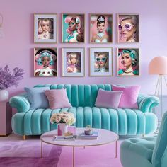 a living room filled with blue couches and pictures on the wall above it's coffee table