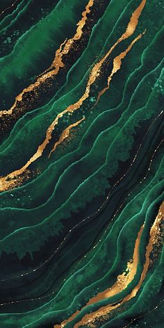 an aerial view of green, gold and black marbled water with ripples in it