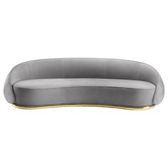 an oval shaped couch in grey velvet with gold trim