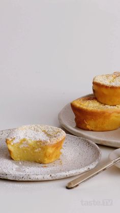 several pastries on plates with forks and spoons