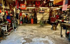 a garage filled with lots of tools and equipment