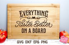 there is a wooden sign that says everything tastes better on a board with apples around it