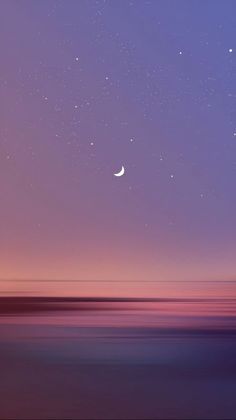 the night sky is filled with stars and crescents above the water's horizon