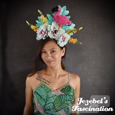 Flamazing - A large tiki fascinator boasting a silly pink flamingo sitting atop a bed of mint and pink accented with a pop of yellow, backed by tropical mint leaves. A great finishing touch to your sassy tiki ensemble! Tropical Hair Piece, Hawaiian Headdress, Flamingo Fascinator, Tiki Outfit, Tiki Oasis, Dyed Eggs, Tiki Head, Tropical Flamingo, Spring Hats