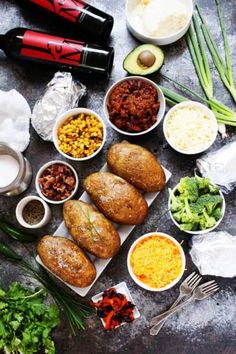 an assortment of food is laid out on a table