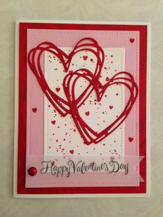 a valentine's day card with two hearts on it