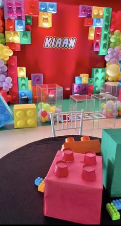 a room filled with lots of colorful lego blocks