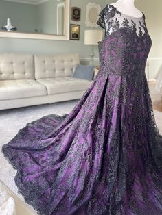 a purple dress on display in a living room