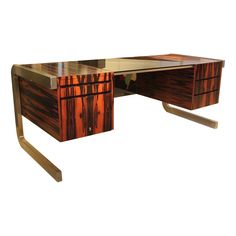 a wooden desk with metal legs and drawers