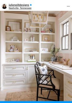 a white desk and some shelves in a room