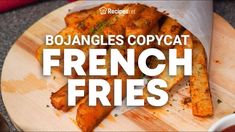 french fries on a wooden cutting board with the words boula angles copycat