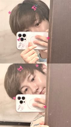 the boy is taking a selfie in the mirror with his cell phone and pink bows on his hair