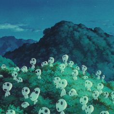 there are many white skulls in the grass and mountains behind them, as if they were floating