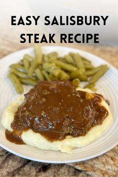 a plate with mashed potatoes, green beans and gravy on it that says easy salisbury steak recipe