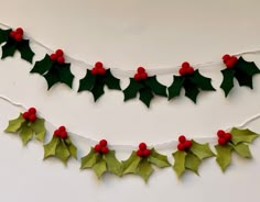 holly garland with red berries and green leaves