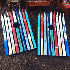 some skis are laying on the ground and ready to be used as snowboards