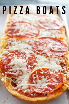 pepperoni and cheese pizza on a baking sheet