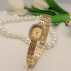 Product information: Color: gold shell gold surface, gold shell green surface, 6334 gold surface white diamond, 6334 rose gold white surface, 6334 silver white surface, 6334 gold green surface, 6346 light gold white shell E... Packing specification: 1 Applicable people: Female Style: vintage diamond Mirror material: Hardened mineral glass Watch buckle style: Jewelry buckle Buckle Material: Metal Watch strap material: metal Dial shape: diamond Case Material: Metal Packing list: Watch x1 Product Image: Chain Watch, Glam Waves, Diamond Mirror, Mirror Material, Gold Face, Female Style, Vintage Material, Rose Gold White, Vintage Diamond