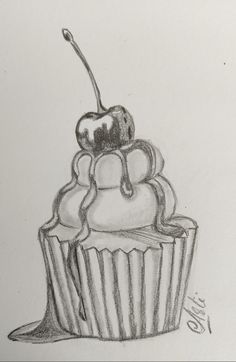 a pencil drawing of a cupcake with a cherry on top and one bite taken out