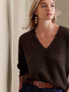 Perfectly plush, this feathersoft sweater is made from our customer-favorite fabrication — deliciously cozy, luxurious cashmere spun for a unique bouclé texture and lightly fuzzed finish.  RELAXED FIT: Expertly cut for a loose fit.  GOOD CASHMERE Wide Neck Sweater Layer, Luxury Classic Henley For Fall, Luxury Classic Shawl Collar Sweater, Luxury Casual Women's Sweater, Luxury Classic Brown Sneakers, Luxury Fitted Casual T-shirt, Luxury Relaxed Fit V-neck Sweater For Fall, Luxury Soft Knit Cashmere Tops, Luxury Cashmere Tops For Spring