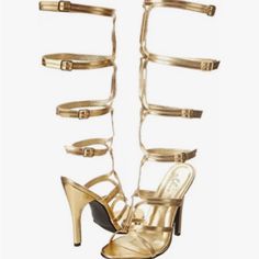 Never Worn Pair Of Gladiator Gold Sandals Strapped Sandals With Buckle Closure For Party, Strapped Synthetic Party Sandals, Adjustable Gold High Heels, Party Heels With Buckle Closure And Straps, Party Heels With Buckle And Straps, Gold Adjustable Closed Toe Heels, Fitted Gold Synthetic Sandals, Vine Heels, Gold Gladiator Heels