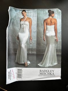 an image of a woman in a white dress on the cover of a sewing pattern