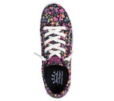 Pretty style meets casual comfort in BOBS from Skechers BOBS B Extra Cute - Floral Night. This vegan sneaker features a cotton canvas upper with an allover multi-floral print, tied-off decorative laces, and a cushioned Skechers Memory Foam insole. For every BOBS purchase, a donation is made to animals in need. | Skechers Women's BOBS B Extra Cute - Floral Night Sneaker | Medium Width | Skechers Memory Foam cushioned comfort insole | No-Tie Fit for ease of wear | Crafted with 100% vegan materials Sporty Multicolor Cotton Sneakers, Multicolor Low-top Fabric Sneakers, Multicolor Fabric Low-top Sneakers, Cotton Sneakers With Floral Print For Spring, Spring Floral Print Cotton Sneakers, Casual Floral Print Cotton Sneakers, Casual Cotton Floral Print Sneakers, Skechers Memory Foam, Vegan Sneakers