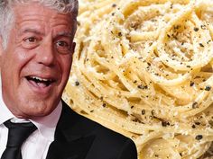 an older man in a suit and tie next to a pile of spaghetti with black pepper