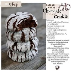 three chocolate crinkle cookies stacked on top of each other in front of an advertisement