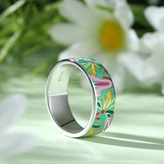 Add a serious dose of radiance to your outfit with splash of color! Bright and whimsical, the silver enamel band ring makes a statement with any outfit. Combine this trendy piece with other enamel pieces to vibrant and radiant effect. Enjoy the benefits of it, such as brining good luck and love, enhancing health and beauty.Weight: 5.84 gWidth: 7.2 mmHeight: 1.7 mmThickness: 1.6 mmMaterial: 925 SilverPlating Color: Silver Hand Painted Jewelry For Spring, Spring Hand Painted Jewelry, Hand Painted Green Summer Jewelry, Green Ring For Spring Gift, Green Rings For Spring Gift, Spring Green Ring As A Gift, Green Ring Perfect For Spring Gifting, Multicolor Enamel Ring As A Gift, Spring Multicolor Hand-painted Jewelry